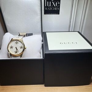 Gucci women’s Gold Watch with gold Accents